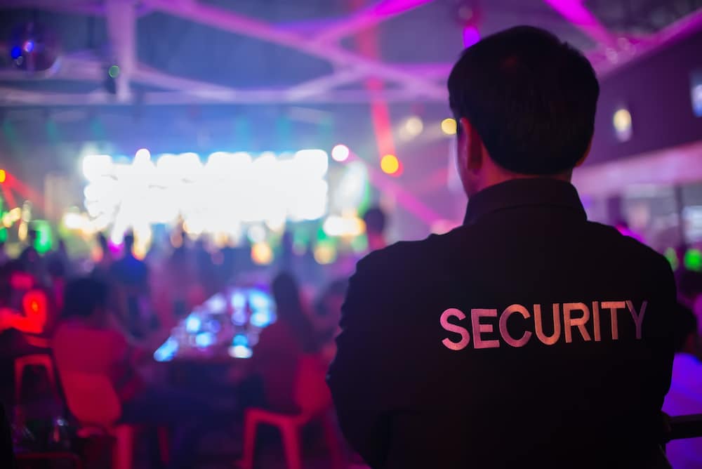 Security officer at a night event shift.