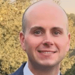 An AMDECON Master Level graduate, Charles Byrd,