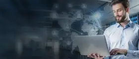 Man using a laptop with digital world map and tech icons in the background, symbolizing global IT and finance training.