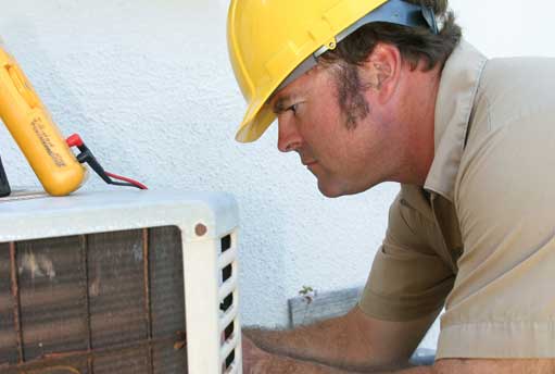 Person repairing AC