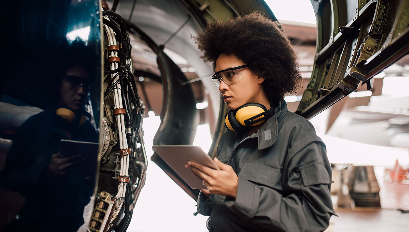 Pro technician with iPad using BILT digital work instructions