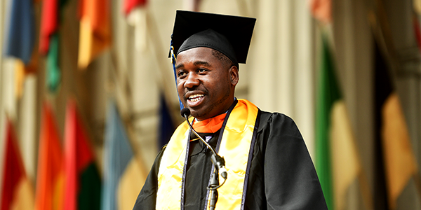 photo of MTM graduate speaking at commencement