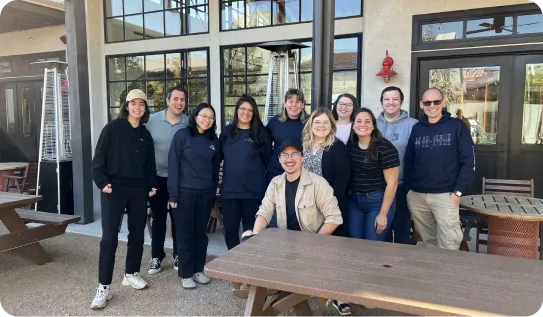A group of people posing for a photo