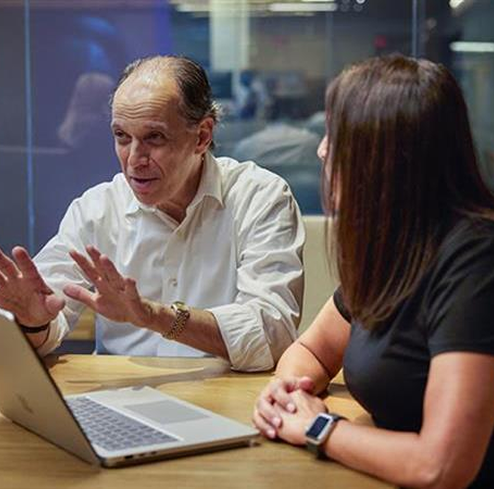 Richard Boscovich, assistant general counsel, DCU, in conversation during a meeting.