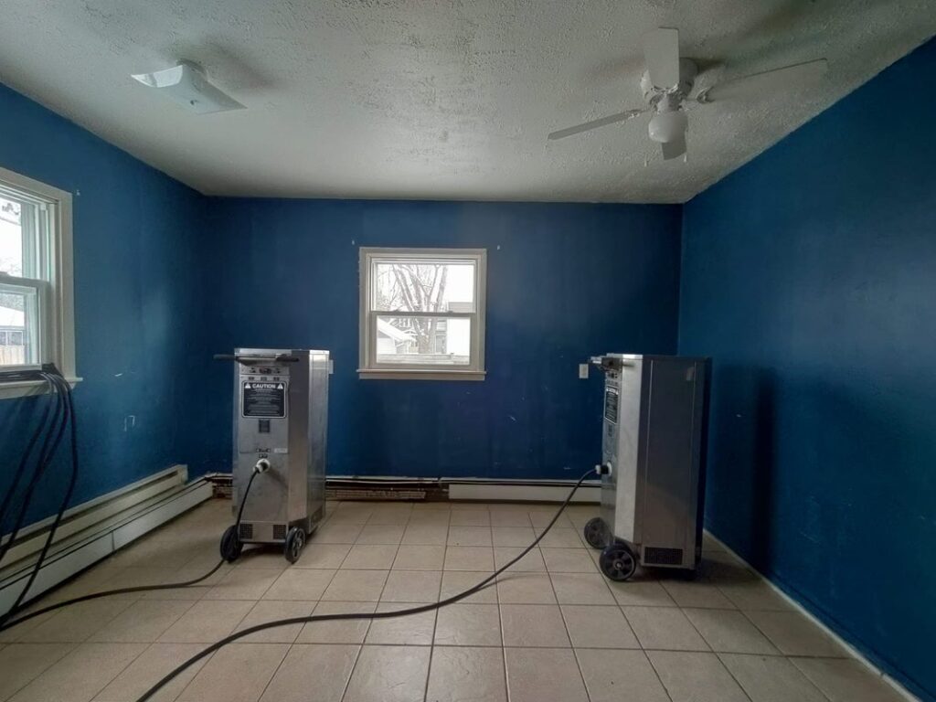 Indoor pest treatment setup with professional drying equipment