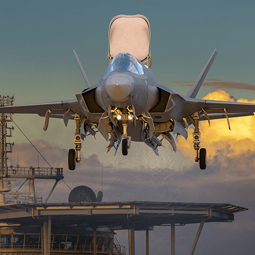 Fighter jet in flight representing high-reliability capacitors for aerospace and defense applications