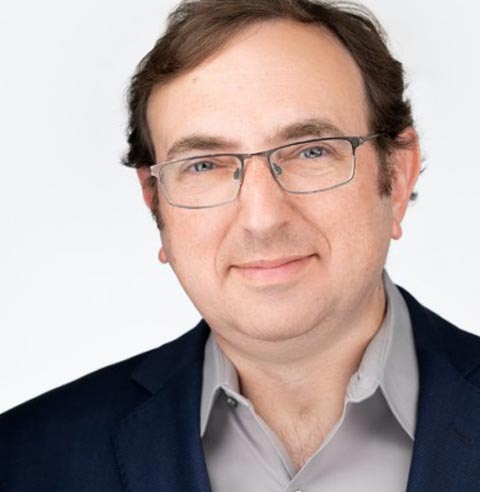 Headshot of George Proakis