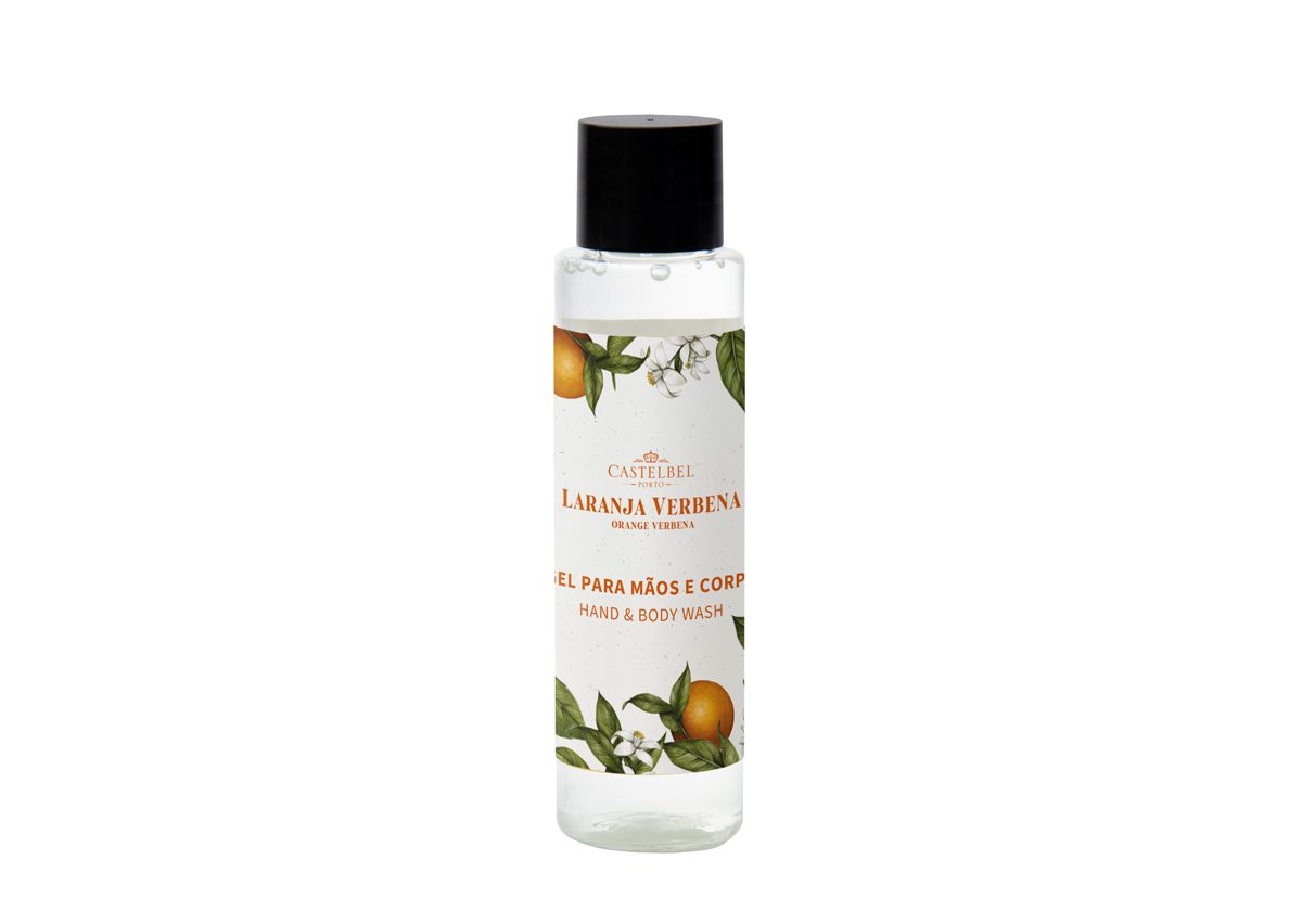 A clear bottle of hand and body wash labeled "Laranja Verbena," featuring an orange and botanical design on the label. The bottle has a black cap.