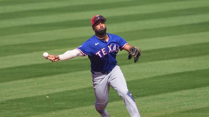 Mar 9, 2026; Peoria, Arizona, USA; Texas Rangers shortstop Ezequiel Duran (20) throws to first base against the San Diego Padres during the third inning at Peoria Sports Complex. Mandatory Credit: Joe Camporeale-Imagn Images Mar 9, 2026; Peoria, Arizona, USA; Texas Rangers shortstop Ezequiel Duran (20) throws to first base against the San Diego Padres during the third inning at Peoria Sports Complex. Mandatory Credit: Joe Camporeale-Imagn Images
