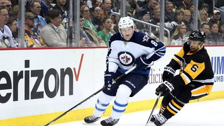 Feb 27, 2016; Pittsburgh, PA, USA; Winnipeg Jets defenseman Jacob Trouba (8) handles the puck Pittsburgh Penguins defenseman Trevor Daley (6) chases during the first period at the CONSOL Energy Center. Mandatory Credit: Charles LeClaire-USA TODAY Sports Feb 27, 2016; Pittsburgh, PA, USA; Winnipeg Jets defenseman Jacob Trouba (8) handles the puck Pittsburgh Penguins defenseman Trevor Daley (6) chases during the first period at the CONSOL Energy Center. Mandatory Credit: Charles LeClaire-USA TODAY Sports