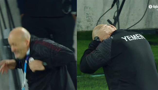 مدرب اليمن يسقط ارضا بعد اصطدام الكرة به في مباراة السعودية