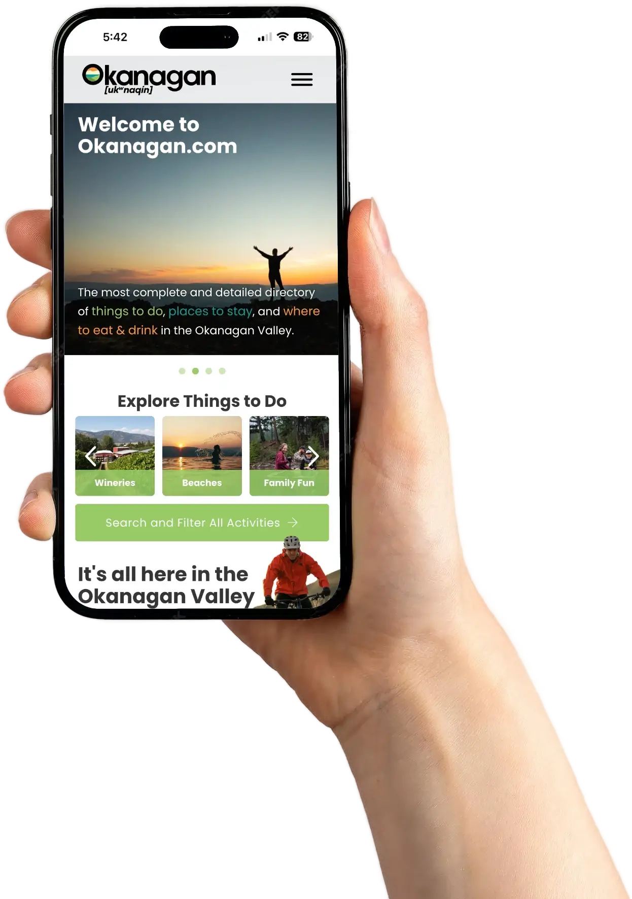 A person holding up a phone with a website displaying the name of the company based in BC, Canada.