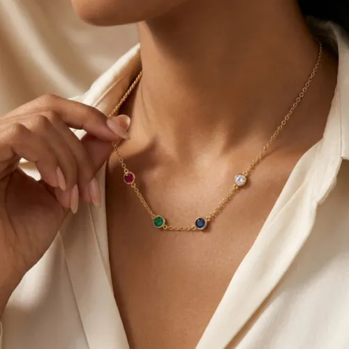 four stone bezel set birthstone necklace on model