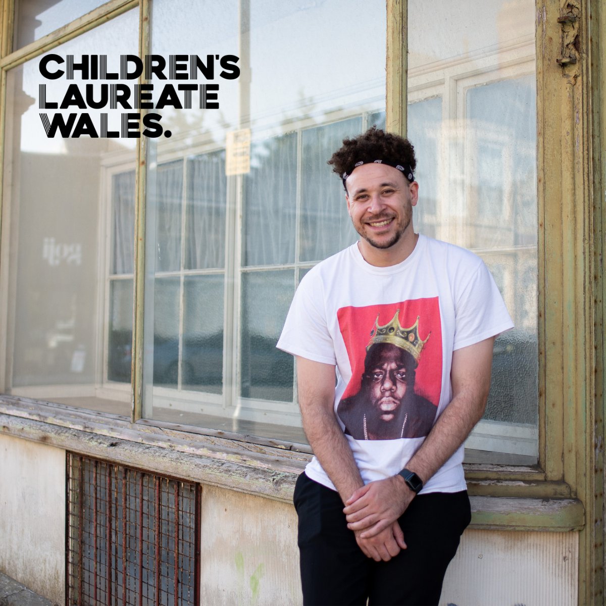 An image of Connor Allen. The words Children's Laureate Wales is at the top left of the image.