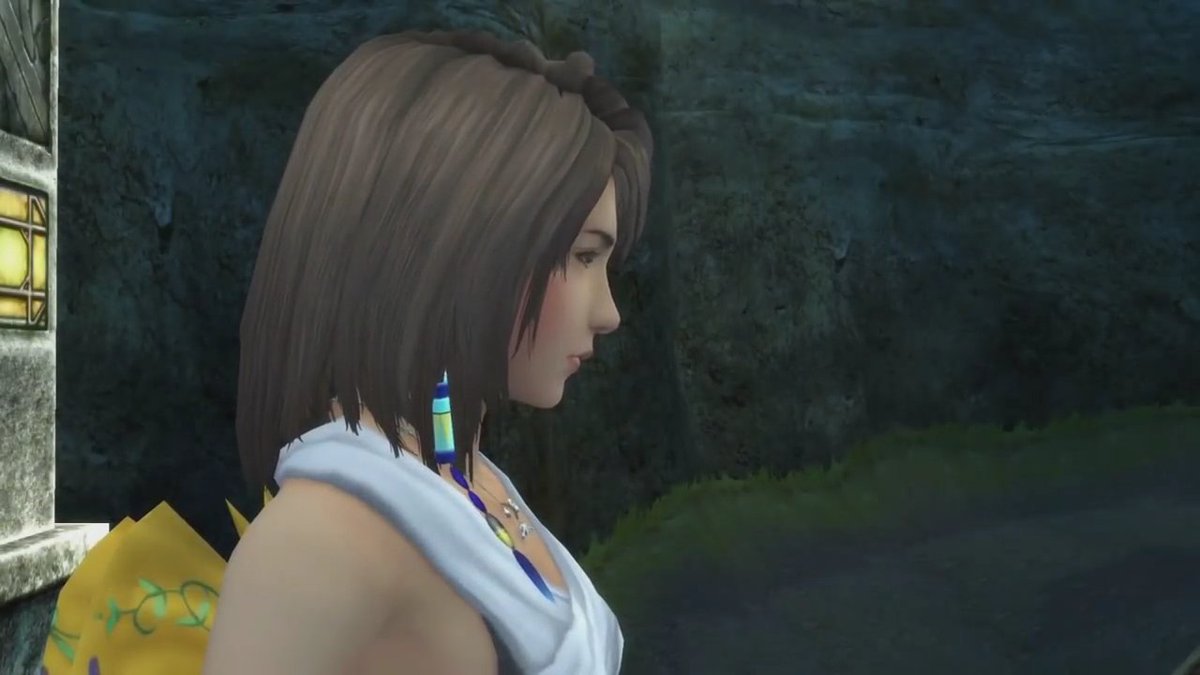 Profile shot of Yuna in FFX standing on a bridge looking out into the distance.