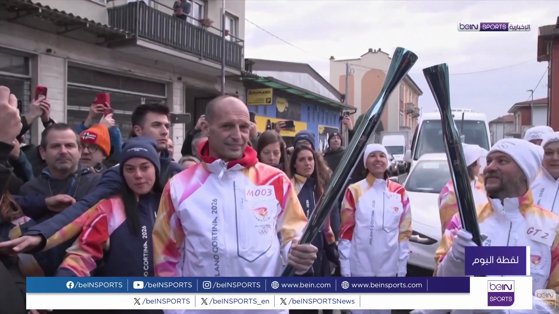 ماسيميليانو أليغري حاملاً للشعلة الأولمبية