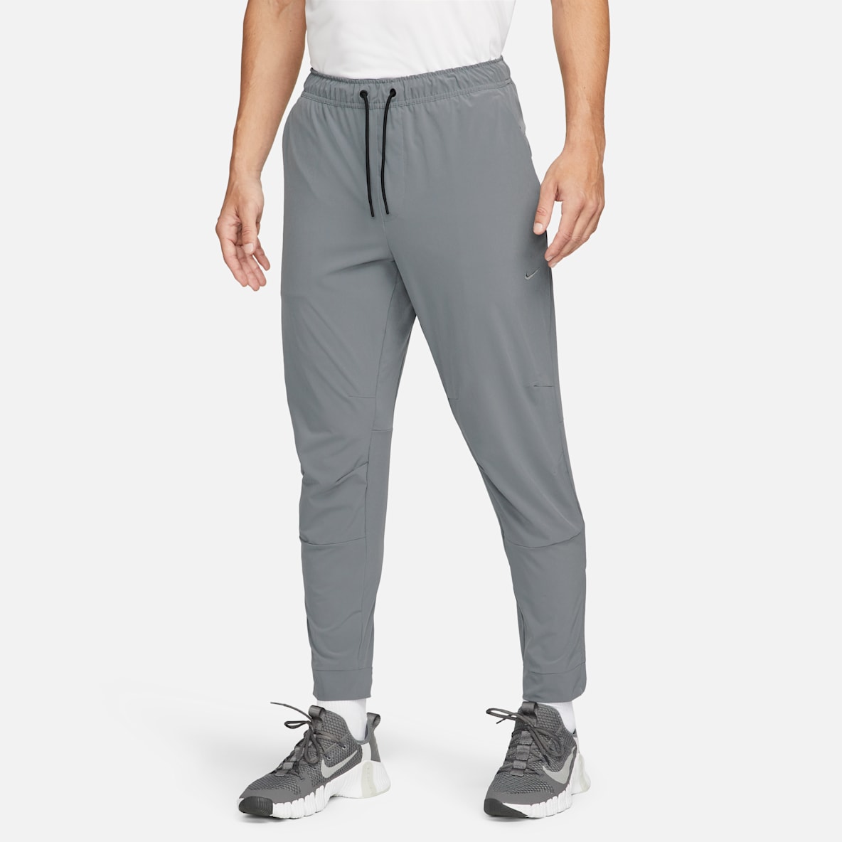 Nike Unlimited Dri-FIT veelzijdige herenbroek met ritsboord
