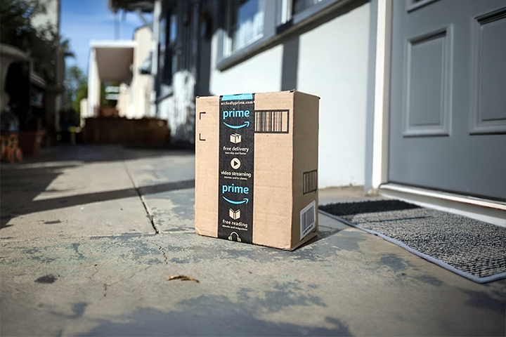 Image: Amazon package insured by U-PIC, delivered safely to a front porch.