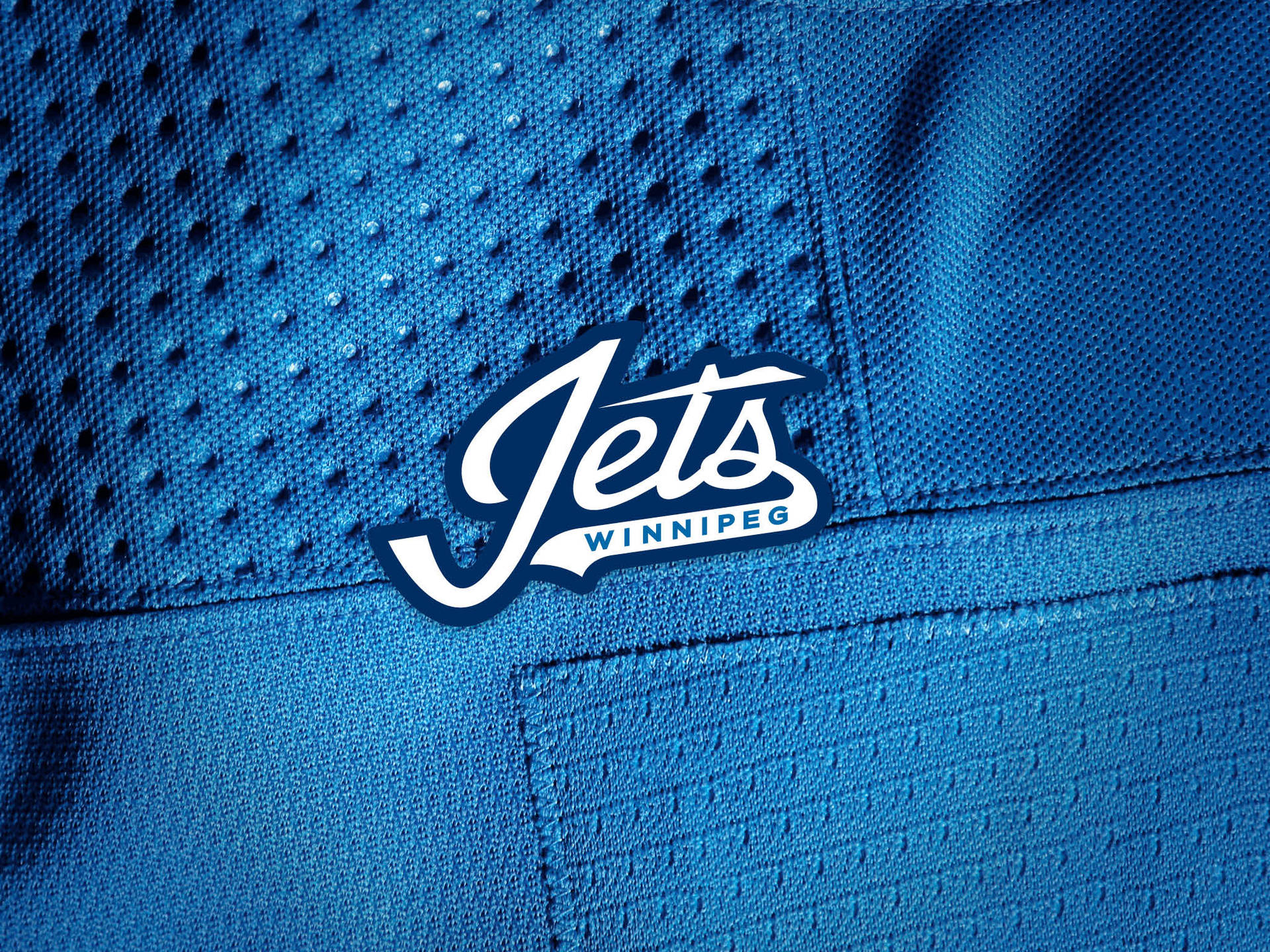 Winnipeg Jets Logo På Jersey Skrivebord Tapet Wallpaper