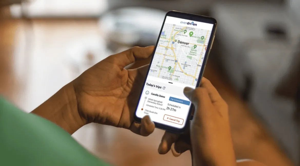 A parent navigates the EverDriven VIP app.