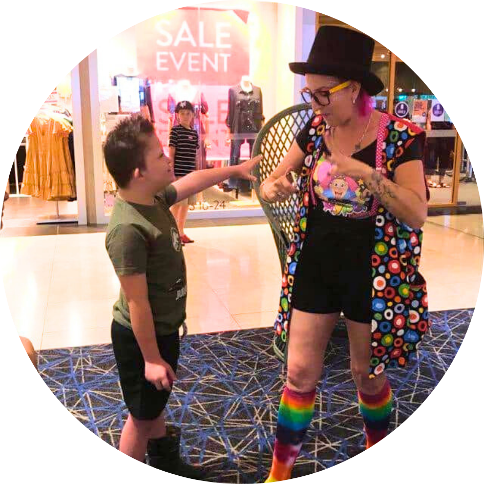 Hyper the Clown performs magic for shoppers at Gateway Shopping Centre in Darwin.