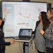 Vicky Venn demonstrates Strelitzia to Sue Poole and Fiona Davies